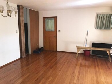 Beautiful wood floors in the dining/den combo