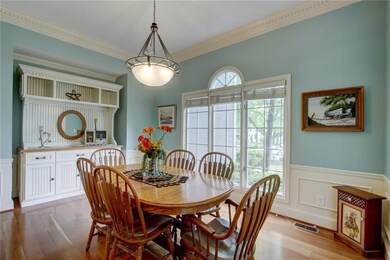 Another view of formal dining room with newer cher