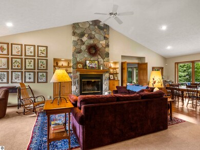 Cathedral ceilings with floor to ceiling stone fir