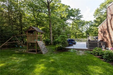 Private yard, composite deck and playground at sid