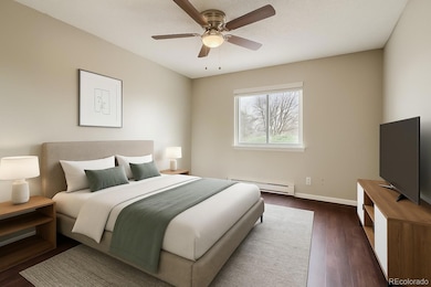 Virtually staged 2nd bedroom with mirrored closet doors