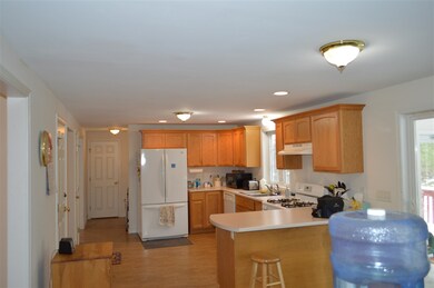 Open and bright kitchen.  Two food pantries and a 