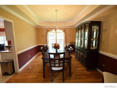 Formal dining room located just off of the kitchen