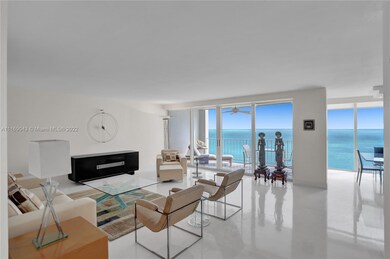 LIVING ROOM WITH MARBLE FLOORS