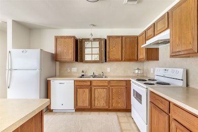 Functional kitchen with ample cabinet space, perfe