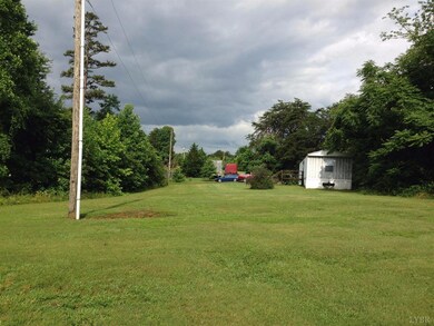 Looking from front yard of same size/style/layout/