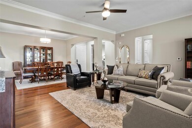 Living room featuring ornamental molding, ceiling 