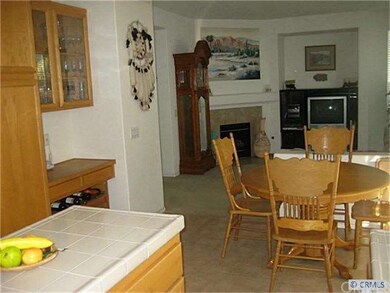 Eat-in kitchen opens to family room