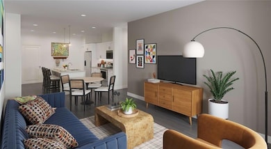 Living room with dark wood-style flooring, recessed lighting, and baseboards