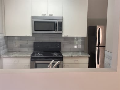 Kitchen with large cabinets