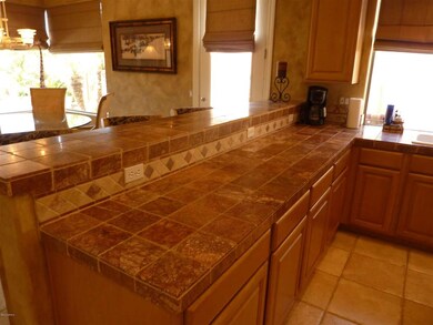 Rich Natural Stone Floors and Counters