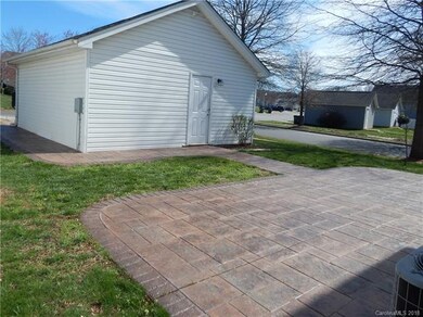 25 x 14 poured patio with sidewalk to and around g