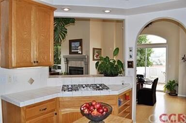 kitchen with open window to dining area and greatr