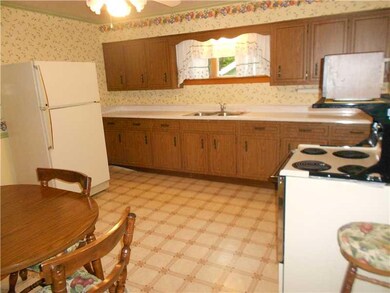 Kitchen. EAT-IN-KITCHEN WITH ELECTRIC STOVE AND RE