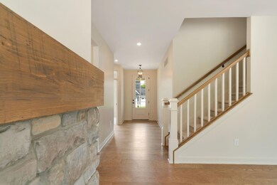 HS-03-049_Beech_Fireplace_View to foyer_