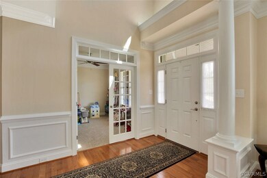 2 Story Foyer - check out the beautiful moldings!!