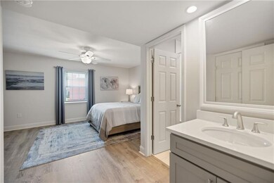 Bedroom with bathroom to the right, closet on the 