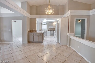 Formal Dining Room. Area has vaulted ceilings, til