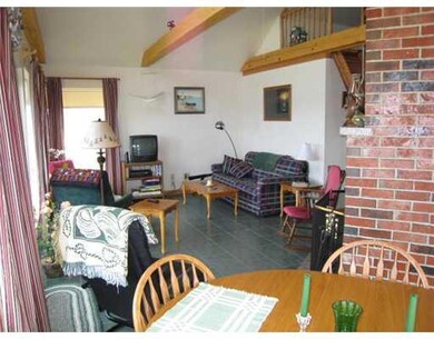 Living room and loft bedroom.