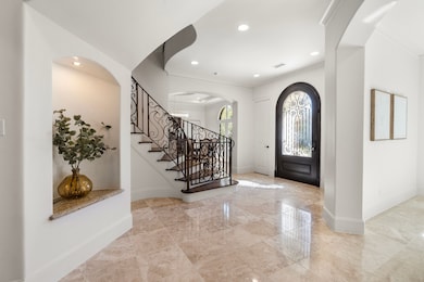 Two closets flank the front door in the foyer, providing plenty of storage space.
