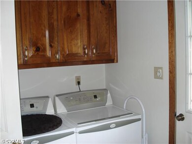 Laundry - Convenient laundry with storage adjacent