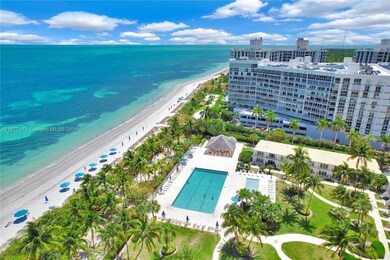 Private beach access with chair and umbrella service, and beachside pool.