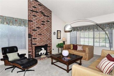 Spacious living room. Offers vaulted ceilings.