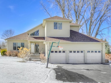 6301 Balsam Ln N. is situated on a beautiful corne