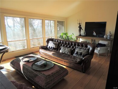 Main Living room with Cathedral ceiling and see th