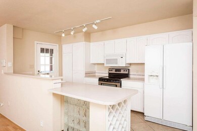 White Cabinetry with Glass Block Detail