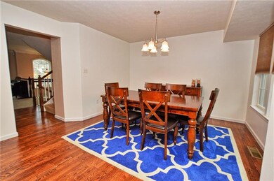 Freshly refinished hardwoods.  Great size dining a