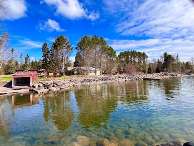 Water view with a dock