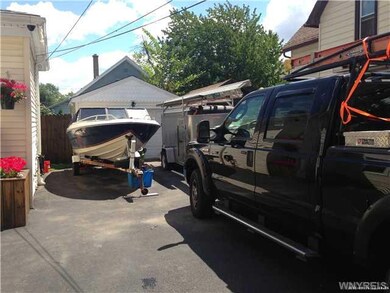Garage. 1.5 garage, double lot, can fit boats and lots of vehicles, also has another drive way on the other side of the home