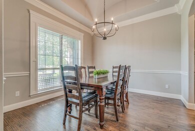 Dining area that could easily be used as office if needed. These wood cased windows!!!  The attention to detail will impress in every room!