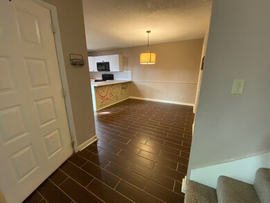 Walking form the living room to the dining area and kitchen