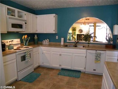 Kitchen - Kitchen view into Dining Room and Great 