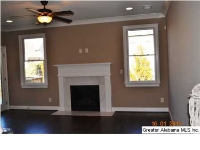 Great room has beautiful hardwood floors.