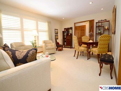 View of living room and foyer from the dining room.