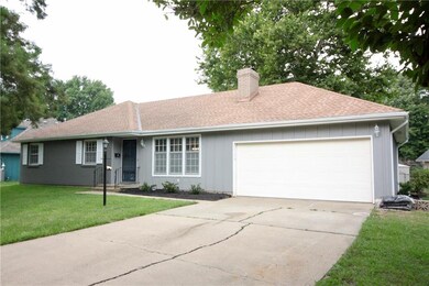 New Guttering, Paint, Garage Door Opener, and Mulc