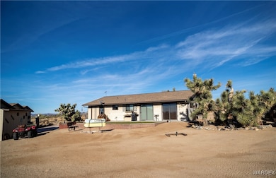 View of back area; patio; fire pit