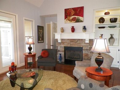 Living Room with Fireplace and Built-in Shelving.