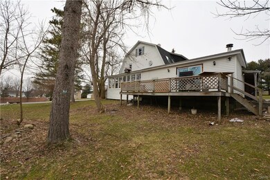 Deck off of right side of home