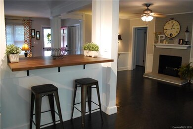 New breakfast bar overlooks living room area.