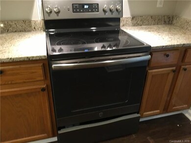Brand new 7 burner glass top range!