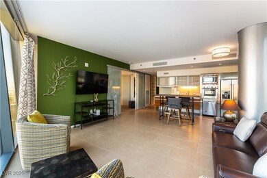 Living area featuring light tile patterned floors