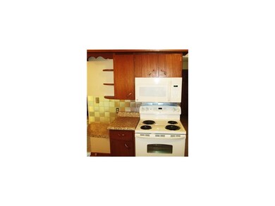 Kitchen. Newer appliances and metal backsplash