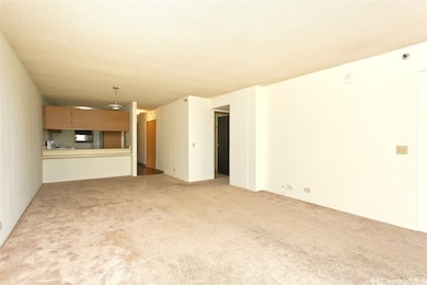 Unstaged living room and dining room shows how lar