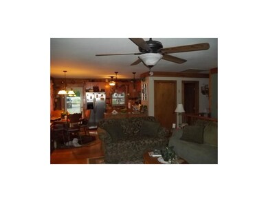 View of living room and kitchen area
