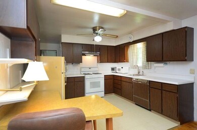 Kitchen with desk area  open to dining