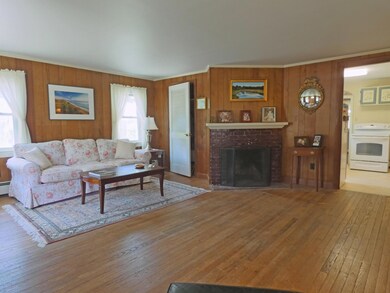 LR to fireplace and kitchen